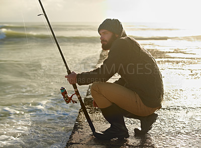 Buy stock photo Man, thinking and fishing on beach in hobby, relax and sea for peace wellness on holiday. Fisherman, natural and vacation in cape town by ocean, adventure and nature by hook for fish to bite