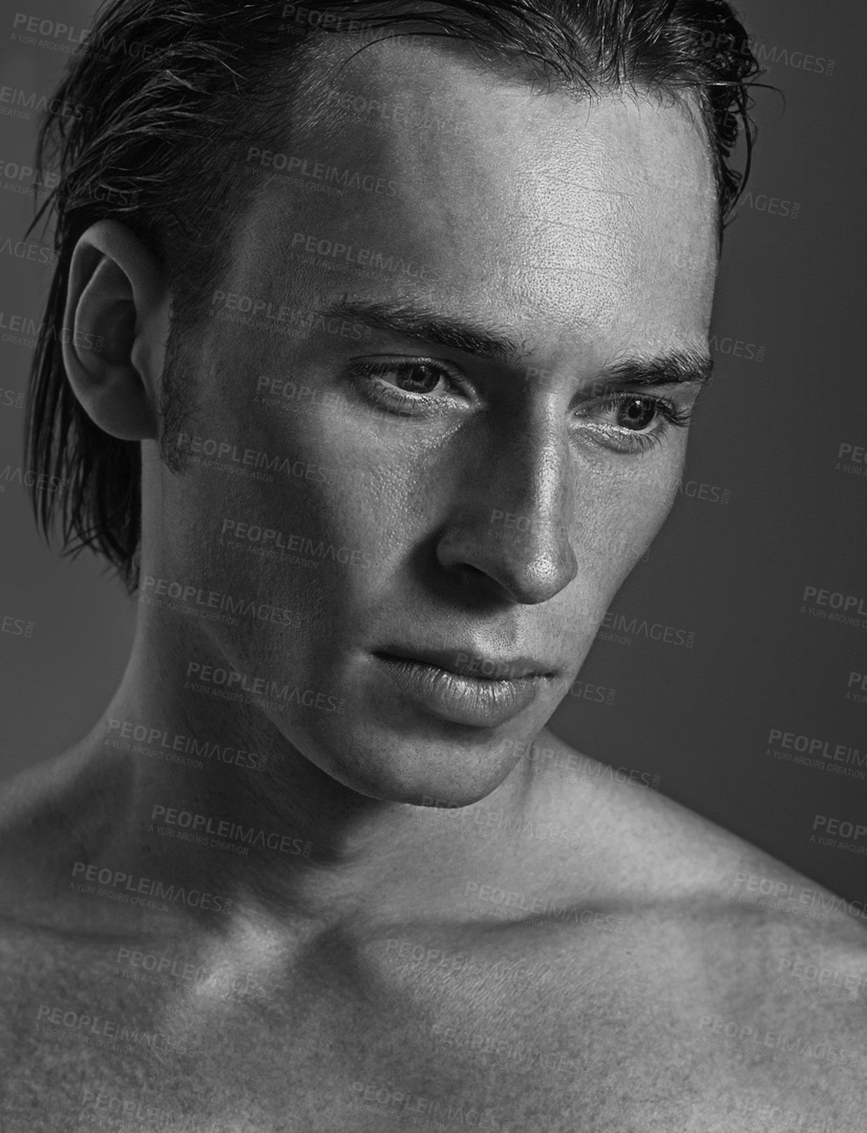 Buy stock photo Thinking, monochrome and man with skincare, masculine cosmetics and wellness on a dark studio background. Person, guy and model with healthy skin and  shirtless with confidence, smooth and beauty