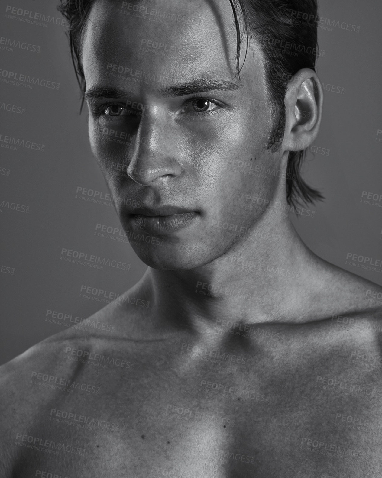 Buy stock photo Face, thinking and serious man in monochrome studio on gray background for masculine cosmetics. Beauty, skincare and shirtless with confident young model in black and white for artistic vision