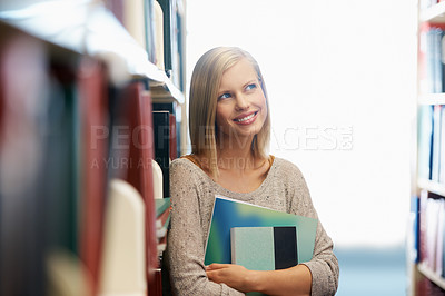 Buy stock photo Woman, library and book, thinking about story for education and knowledge with smile on campus. College student with future, remember reading and inspiration for studying with learning material