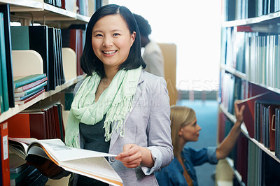 Buy stock photo Woman, portrait and smile with book in library or studying for university education, scholarship or knowledge. Asian person, face and reading at college in Korea or project test, revision or academic