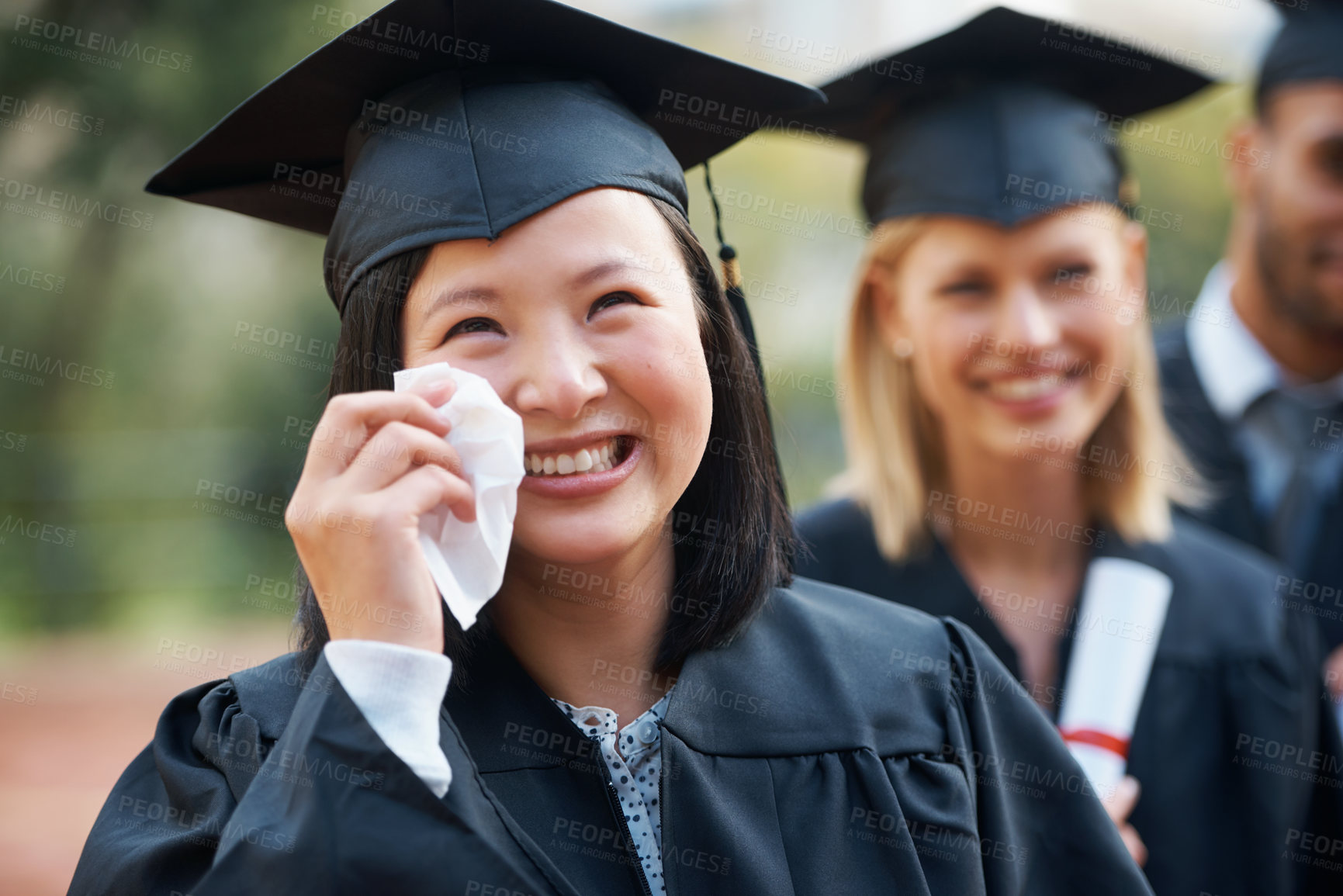 Buy stock photo Students, graduation and woman with crying, excited and happiness with success and ceremony. People, tears and outdoor with person and friends with diploma and celebration with degree or university