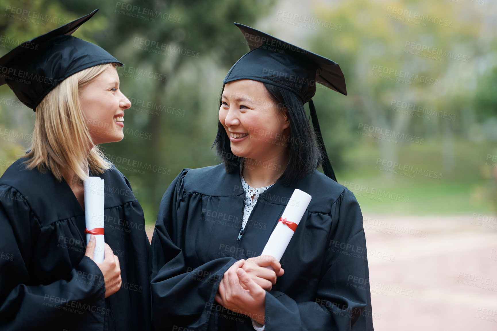 Buy stock photo Graduation, campus or friends happy with education event, future goal or studying for opportunity. Women, smile or proud college graduate with success, certified achievement or university scholarship