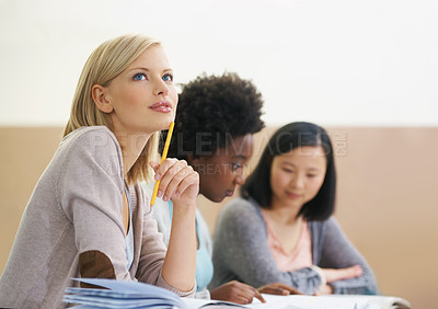 Buy stock photo Student, woman and planning in university classroom, information and notes for research. People, thinking and knowledge in education for learning, problem solving and ideas for solution in assessment