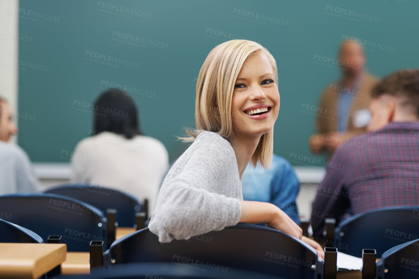 Buy stock photo Portrait, students and woman with knowledge, funny and university with learning and studying. Face, people and girl in lecture hall with academy, education and scholarship in a classroom and happy