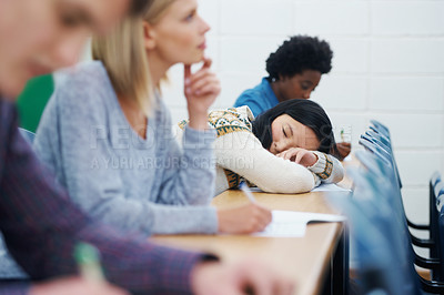 Buy stock photo Student, university and sleeping on desk in classroom for boring lecture or burnout, fatigue or scholarship. People, college and diversity with research paper in USA for learning,  knowledge or tired