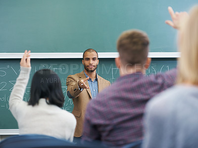 Buy stock photo Cropped shot of a lecturer addressing his students