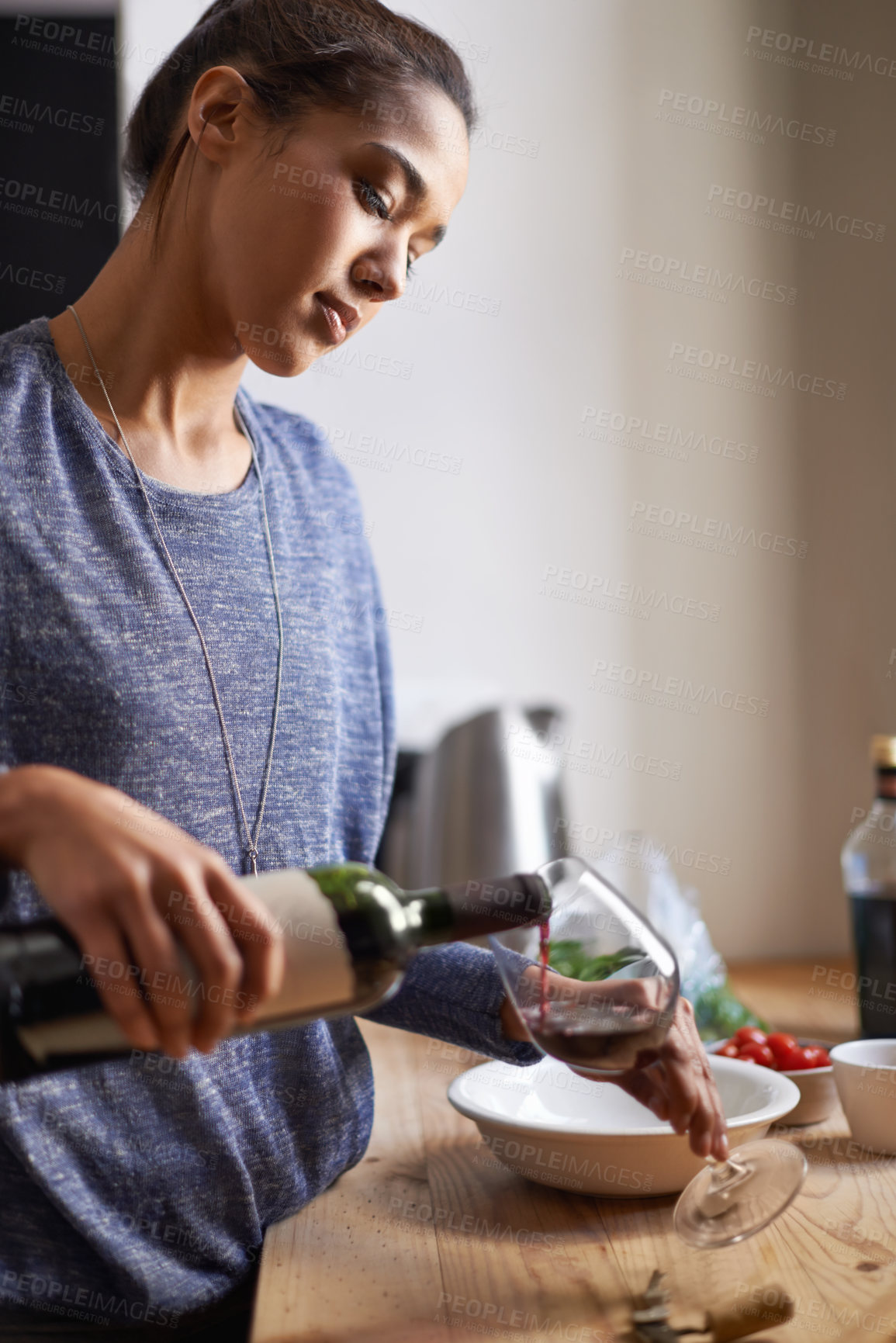 Buy stock photo Woman, pouring red wine and home for dinner, relax for peace and leisure with drink in kitchen. Alcohol, glass and bottle with refreshment, hydration with beverage to celebrate or chill in apartment