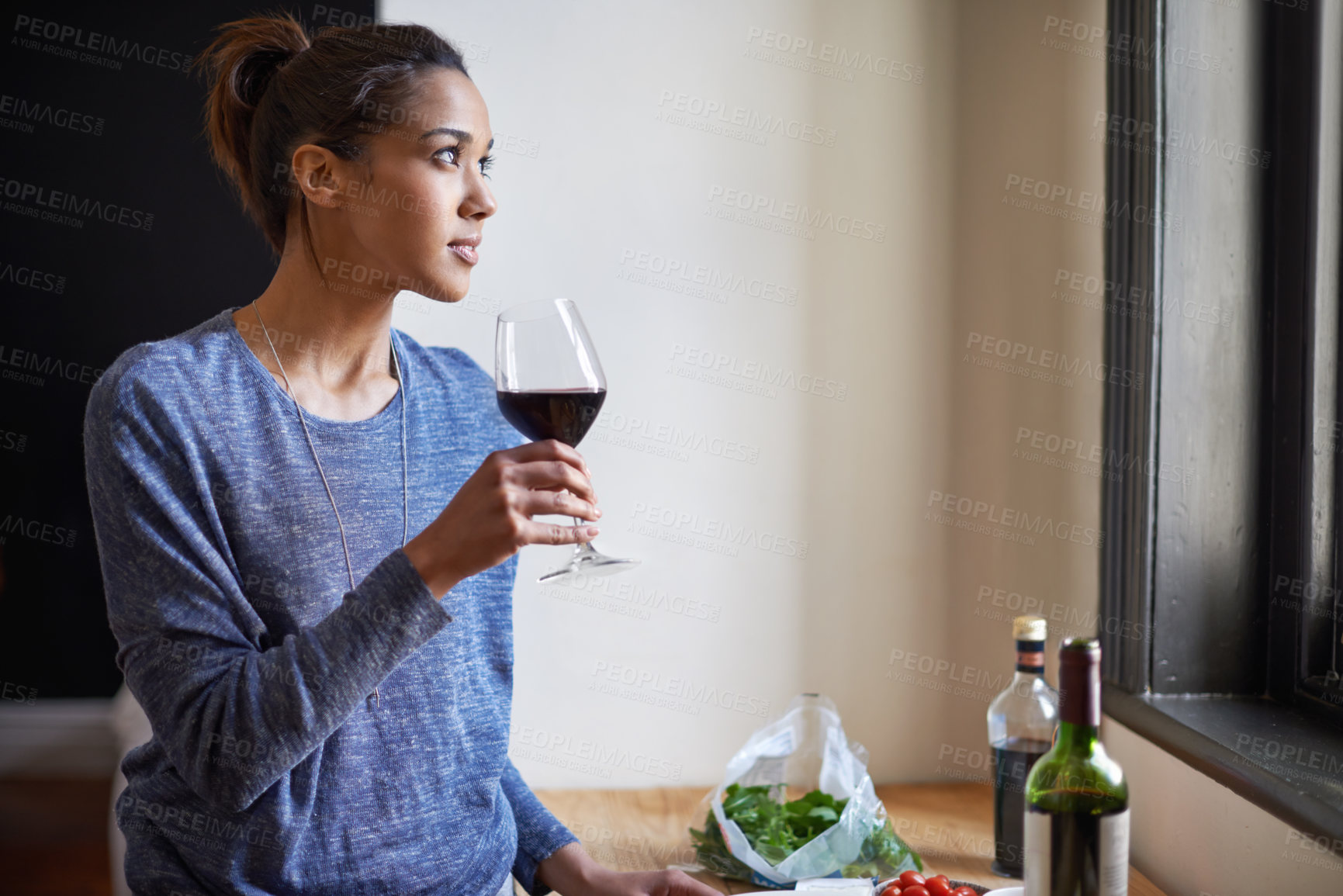 Buy stock photo Woman, red wine and thinking in kitchen, reflection and future, drink and food for cooking at home. Relax with alcohol in glass, inspiration or insight with memory, enjoy and wellness with beverage