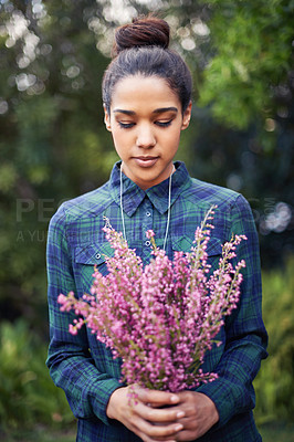 Buy stock photo Woman, flower bouquet in garden and nature, Spring and blossom with offer or gift in environment. Purple plant, present and botanical with sustainability and romantic gesture outdoor in park