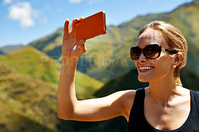 Buy stock photo Woman, photography and mountains for travel, phone and hiking or outdoor journey in nature. Happy person, hiker or tourist with picture while trekking, vacation and explore countryside in Europe