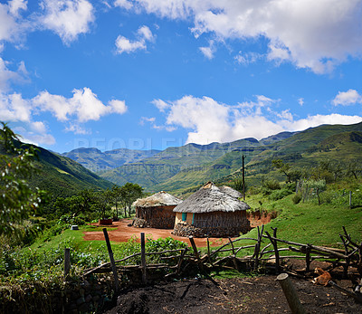 Buy stock photo Rural, village and hut in landscape with mountains, nature and summer in countryside of Africa. Cottage, home and travel to remote cabin in bush, field or outdoor in natural environment with houses