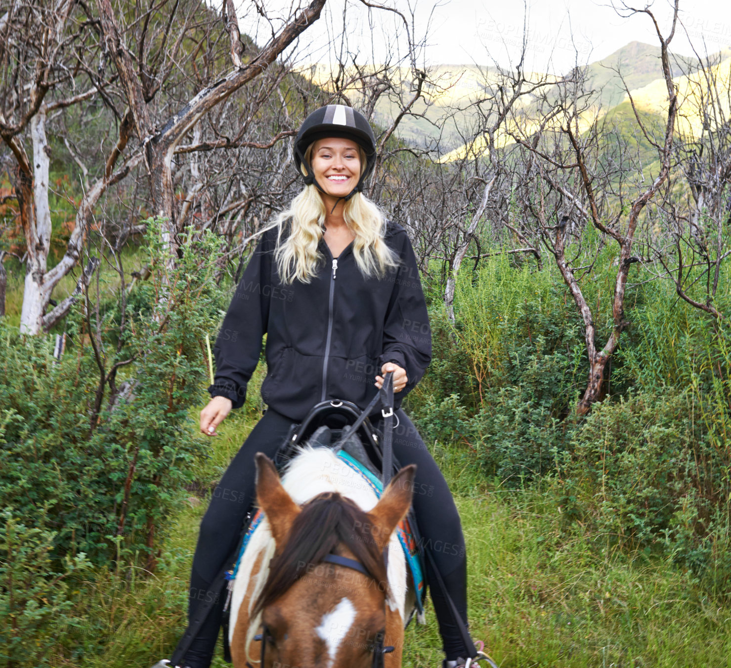 Buy stock photo Horse, riding and portrait of woman on adventure in vacation or holiday journey on path in nature. Training, animal and person travel on trail with pet in countryside, woods and summer with happiness