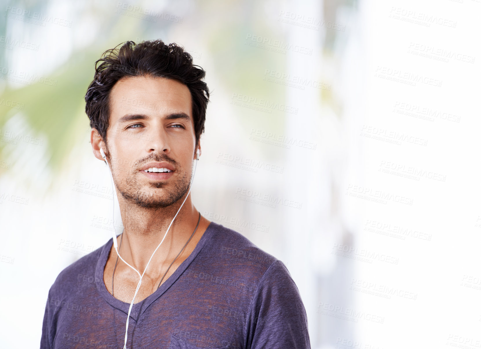 Buy stock photo Man, thinking and smile with earphones for idea, podcast or streaming online on mockup. Male person, happy and confident with listening to music on headphones for enjoyment, fun and wellness