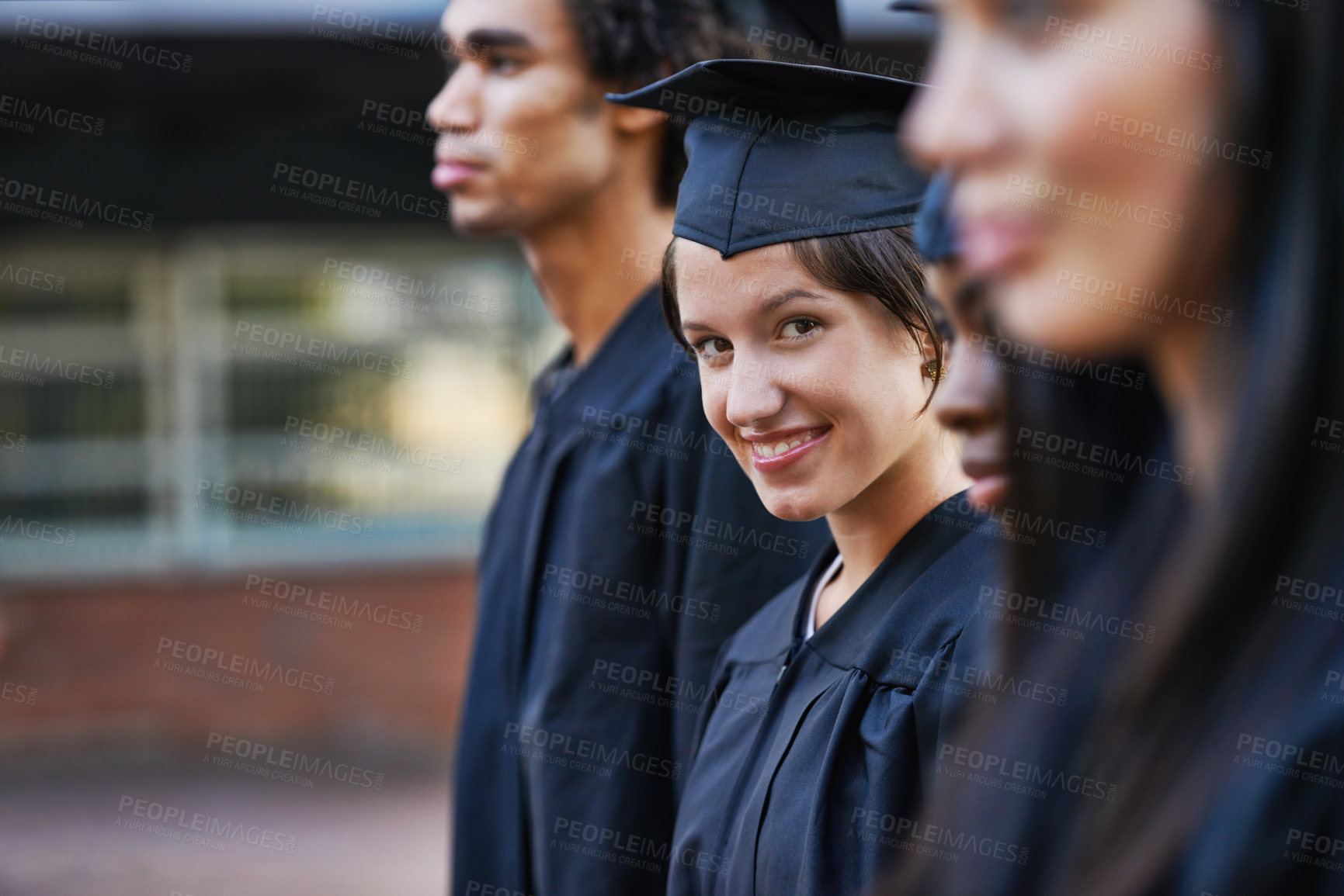 Buy stock photo Woman, student and portrait at graduation, education and university success or achievement. Happy female person, smile and pride at outdoor ceremony, accomplishment and knowledge in qualification