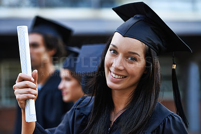 Buy stock photo Woman, student and portrait at graduation, scroll and university success or achievement. Female person, smile and pride at outdoor ceremony, higher education and degree or diploma for credential