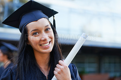 Buy stock photo A young college graduate smiling at the camera
