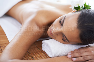 Buy stock photo A young woman lying in a health spa