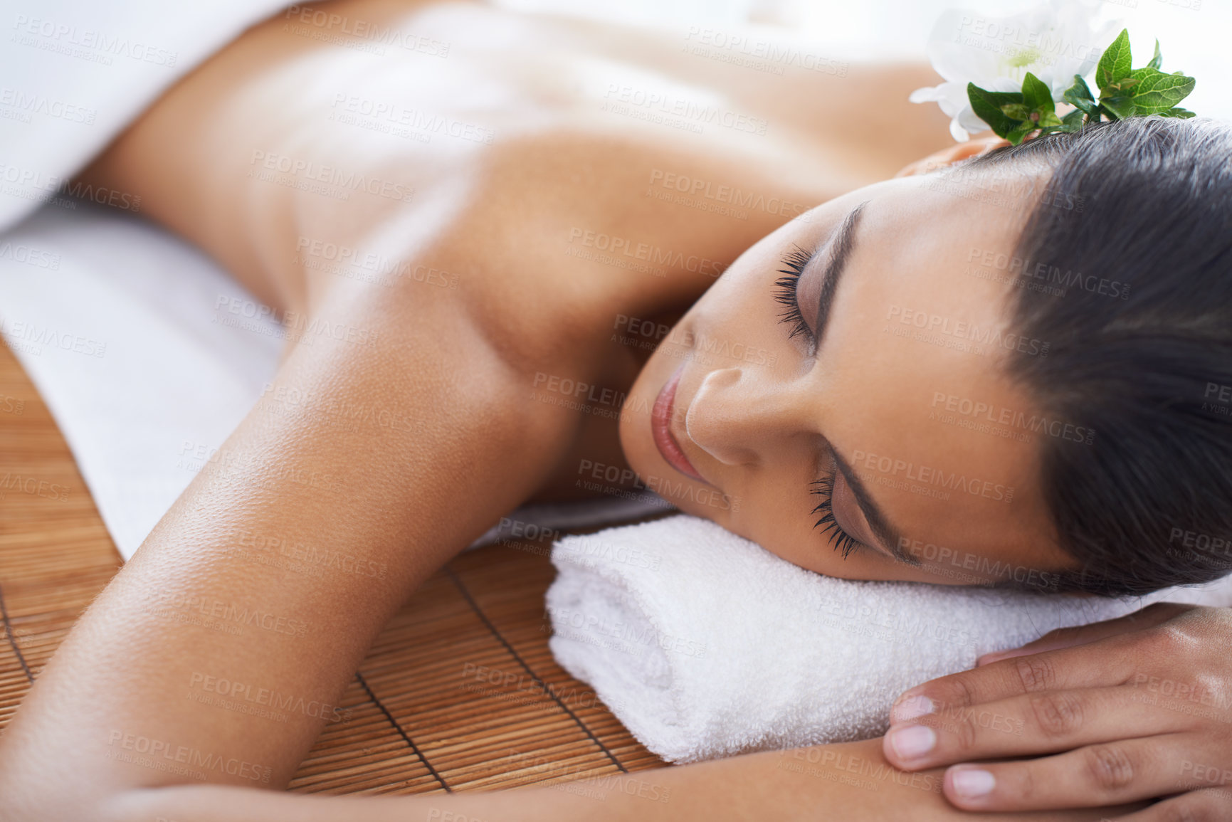 Buy stock photo A young woman lying in a health spa