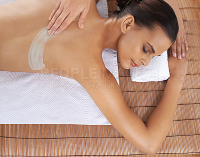 Buy stock photo Top view, hand and massage woman with mud for skincare, exfoliation or detox at table. Above, therapist and person at salon to pamper back, relax or healthy body treatment with masseuse at luxury spa
