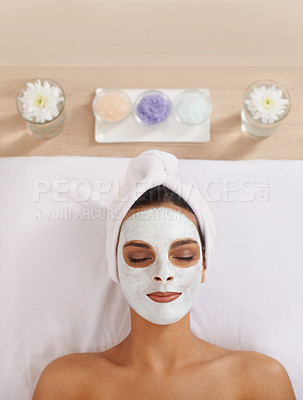 Buy stock photo Woman, face mask and cosmetology for beauty in spa, detox and cosmetic treatment for salon facial. Person, relax and aromatherapy with natural clay on skin, calm and skincare for dermatology on bed