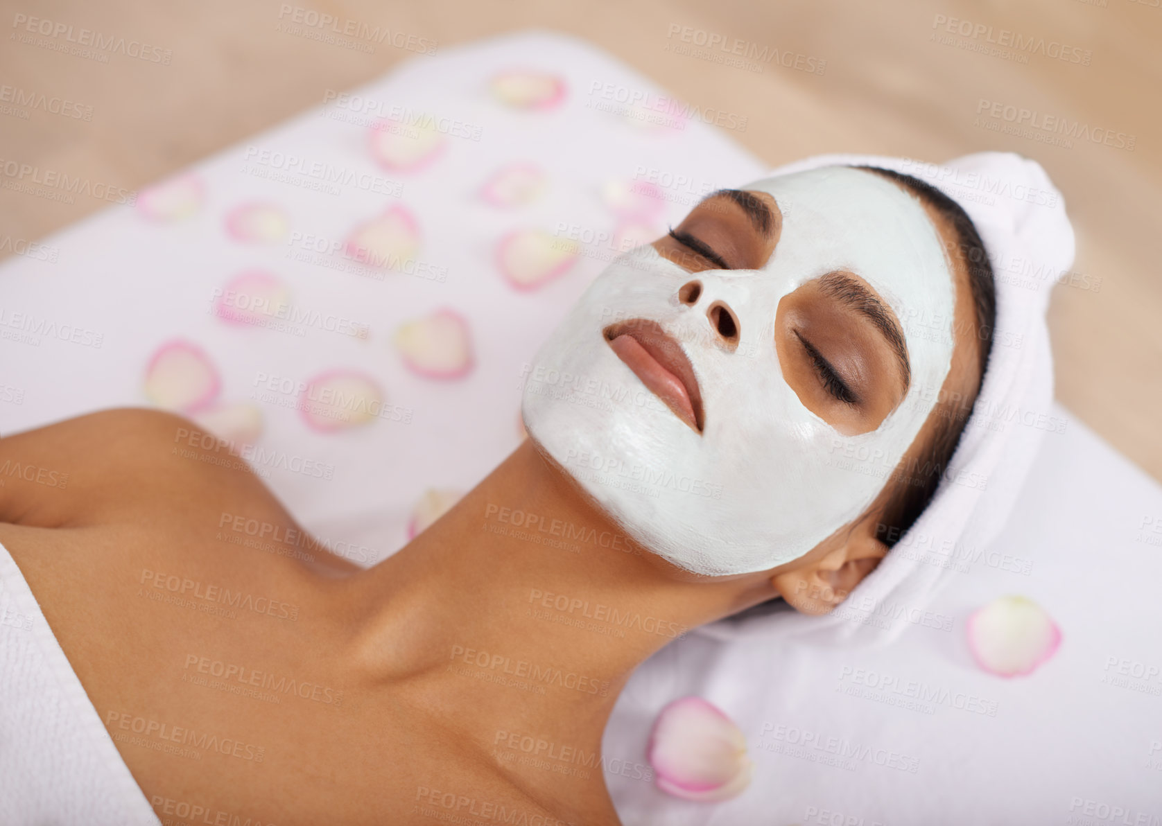 Buy stock photo Woman, rose clay mask or facial for skincare in salon, detox or cosmetic treatment for beauty or health. Person, relax or dermatology with natural moisture on skin, cool or zen with wellness in spa