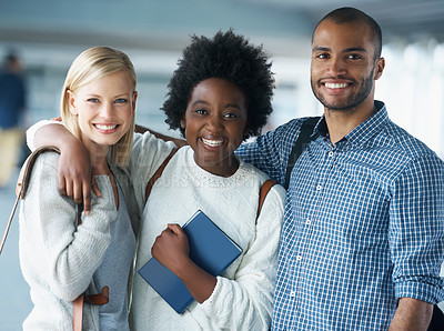 Buy stock photo A group of college students standing together and smiling