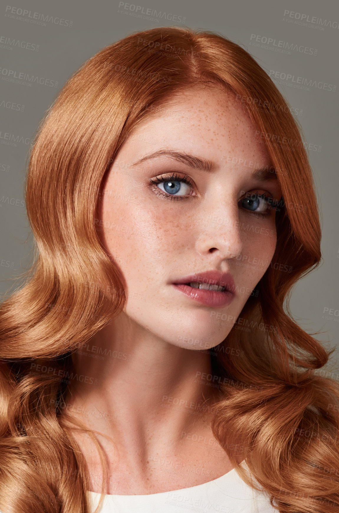 Buy stock photo Hair, face and natural beauty in portrait with red locks, balayage and cosmetic care on studio background. Ginger, makeup and female model from Russia, haircare and shine with glamour and skin glow