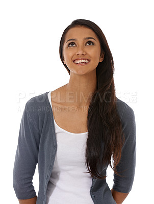 Buy stock photo A beautiful young ethnic woman smiling against a white background