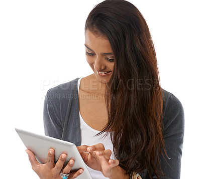 Buy stock photo Tablet, scroll and woman in studio networking on social media, app or the internet. Smile, communication and young female person browsing on website with digital technology by white background.