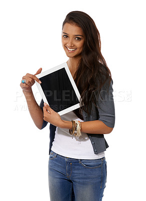 Buy stock photo A young ethnic woman presenting a digital tablet