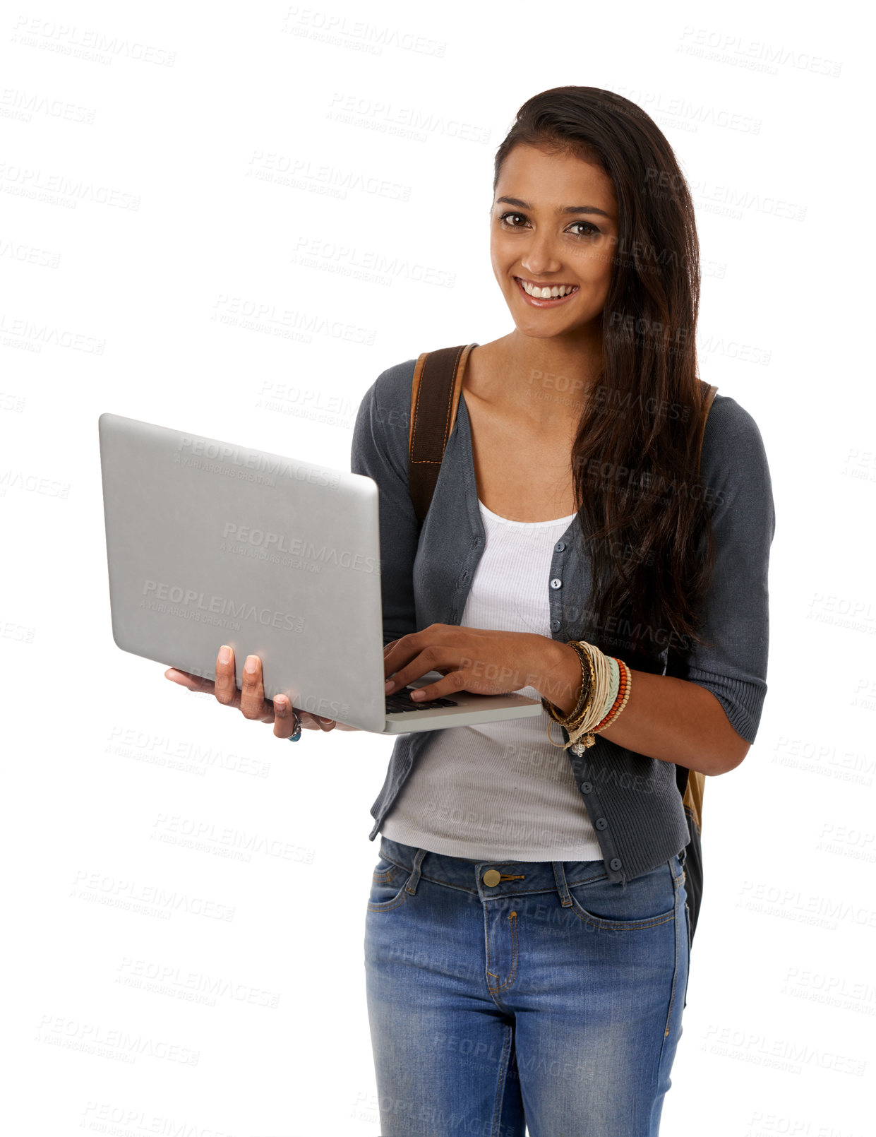 Buy stock photo A college student with a backpack and a laptop smiling at the camera