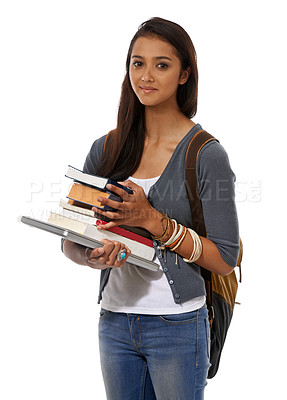 Buy stock photo A young ethnic woman with a laptop and a pile of books