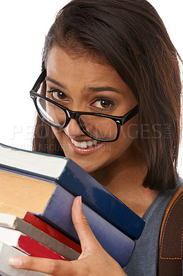 Buy stock photo Student, portrait and glasses with books as nerd for education in studio for university, learning or future. Female person, face and white background with eyewear for smart academy, reading or India