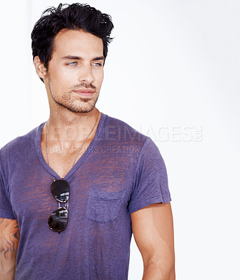 Buy stock photo Man, fashion and smile with thinking in studio for trendy, stylish and confidence on white background. Male person, memory and planning for opportunity, vision and sunglasses on t-shirt with mockup