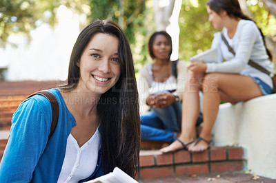 Buy stock photo Cropped portrait of a female college student ready to join a study group on campus