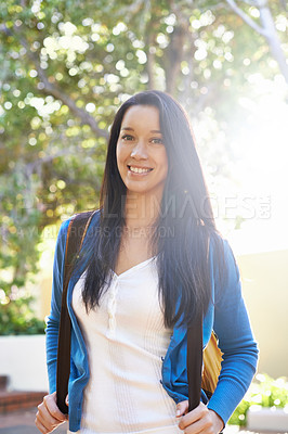 Buy stock photo Happy woman, portrait and student with bag on campus for back to school, learning or education. Young female person or academic learner with smile and backpack in nature at college or university