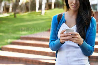 Buy stock photo Typing, woman and outdoor with phone at college for social media and walking with communication in park. Online, chat and girl with virtual contact on smartphone, connection and  networking in Paris