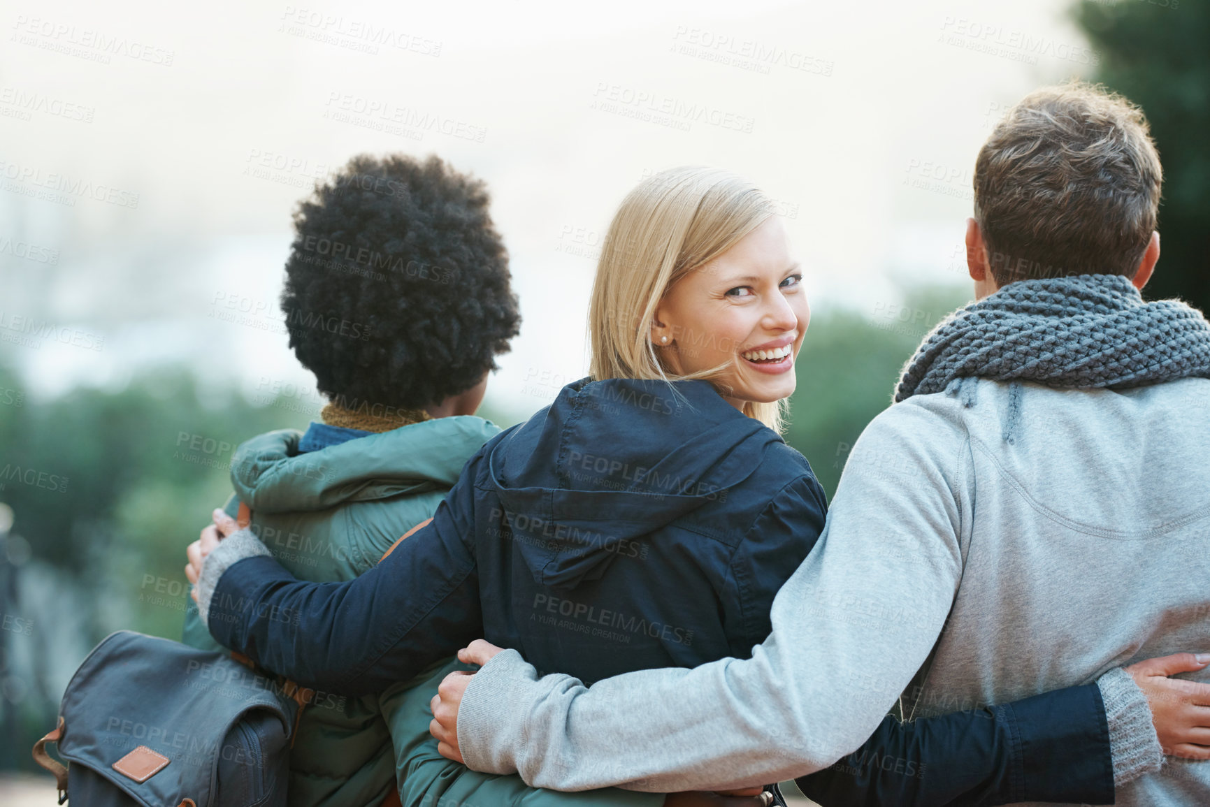 Buy stock photo College, friends and portrait with hug or smile for bonding, relax and break on campus with diversity. University, people and happy with embrace for support, education and learning fun with rear view