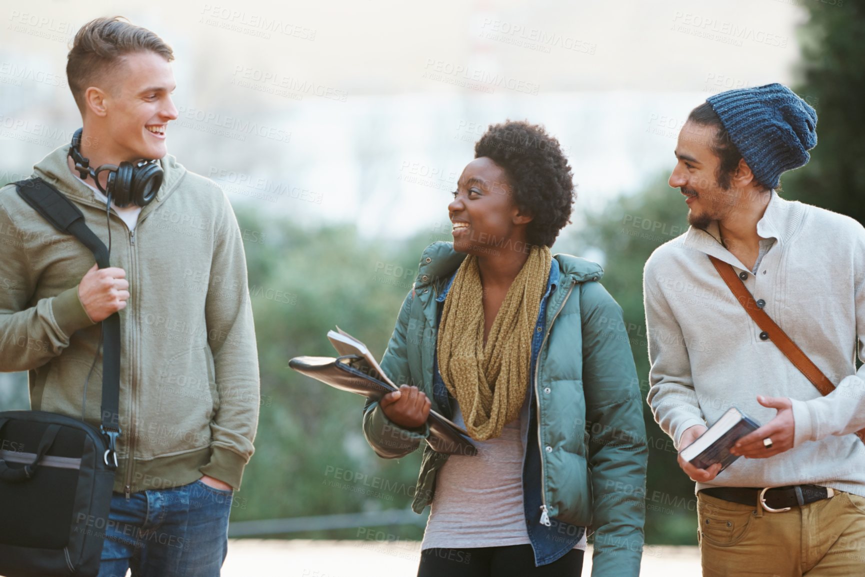 Buy stock photo Shot of a college students between classes on the campus grounds