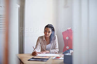 Buy stock photo Fashion designer, woman and drawing on paper with pencil in startup office of small business. Creative, person and tailor sketch at desk for project, planning or writing draft for ideas of clothes