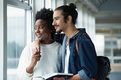 Buy stock photo Couple, hug and students with a book, college and conversation for research and happiness. View, man and woman with ideas or brainstorming with planning and teamwork with embrace, love or cooperation