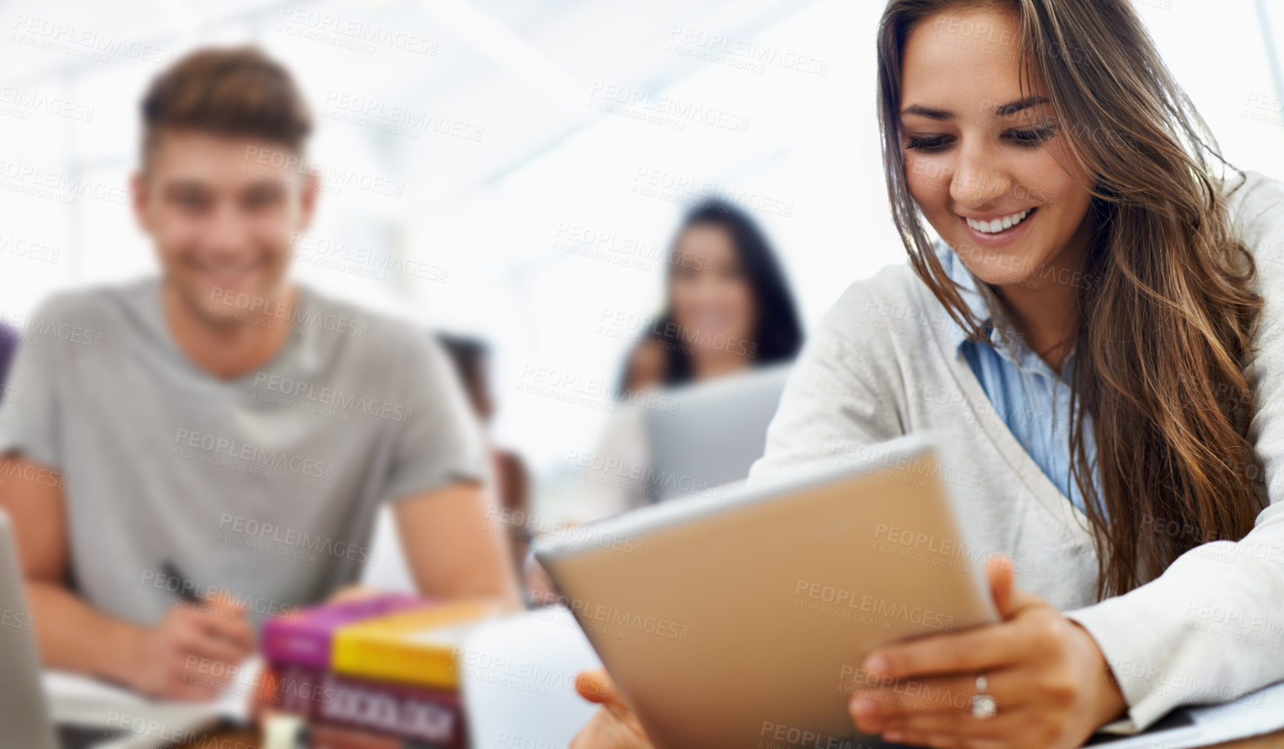 Buy stock photo Happy students in a college classroom