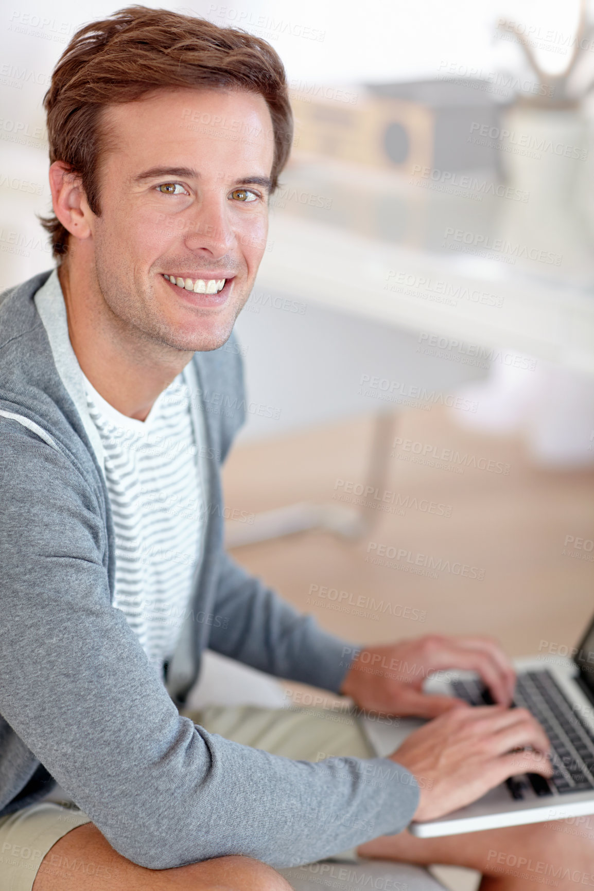 Buy stock photo Man, portrait and laptop in house with confidence, positive and freelancer on typing project in living room. Person, smile and face by pc for online connection, entrepreneur and working in apartment