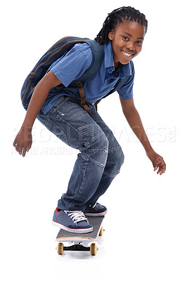 Buy stock photo Skateboard, student or portrait of African kid in studio with smile, skill or trick with bag or cool style. Skater, performance or happy child skateboarding with energy isolated on white background