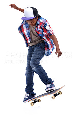 Buy stock photo Skateboard, trick or African kid in studio with trendy fashion, skill or talent with jump or cool style. Skater, performance or young male child skateboarding with energy isolated on white background
