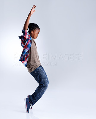 Buy stock photo Dance, hip hop and young child dancer dancing isolated in a white studio background in a pose feeling excited. Talent, mockup and kid or child with energy and skill ready for breakdance performance
