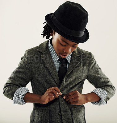 Buy stock photo Black child, suit and fashion in studio for vintage style and confidence on a white background. Retro kid or boy check his clothes, coat and fedora hat for fancy character, cosplay and formal 