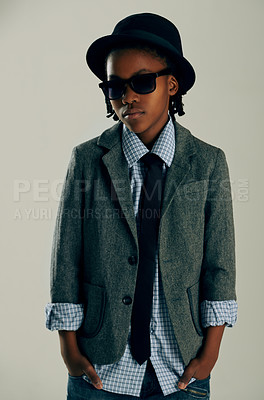 Buy stock photo Kids, fashion and boy child with suit in studio for stylish, cool or trendy outfit choice on grey background. Children, sunglasses and African model with elegant, style or edgy personality or clothes