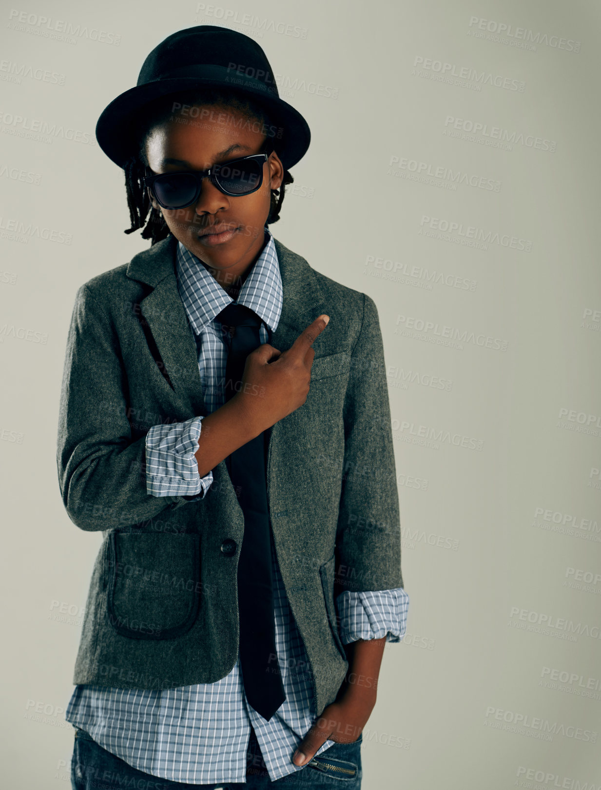 Buy stock photo Kids, fashion and boy with hand pointing in studio for clothing, sale or news mockup on white background. Sunglasses, children and African model show deal, offer or discount, platform or announcement
